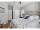 Relaxing bedroom showcasing a comfortable bed, wood floors, and an abundance of natural light at 709 Triple Oak Ln., Garden City Beach, SC 29576