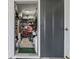 Storage area with shelves, tools, and equipment, providing ample space for organization and storage at 709 Triple Oak Ln., Garden City Beach, SC 29576