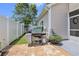 Private backyard features a grill, lush lawn, and well-maintained landscaping at 800 Monarch Dr. # 49, Myrtle Beach, SC 29588