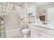 Functional bathroom with a shower-tub combo and beach themed shower curtains at 800 Monarch Dr. # 49, Myrtle Beach, SC 29588