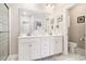 Bright bathroom with double vanity, marble floors and a separate toilet room at 800 Monarch Dr. # 49, Myrtle Beach, SC 29588