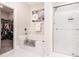 Stylish bathroom with soaking tub, glass shower, and walk-in closet at 800 Monarch Dr. # 49, Myrtle Beach, SC 29588