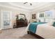 Inviting bedroom with tray ceiling, dresser and plush bedding at 800 Monarch Dr. # 49, Myrtle Beach, SC 29588