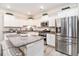 Bright kitchen featuring stainless steel appliances, granite countertops, and white cabinetry at 800 Monarch Dr. # 49, Myrtle Beach, SC 29588
