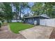 This backyard features lush green grass and a fenced-in area, providing privacy and security at 804 47Th Ave. N, Myrtle Beach, SC 29577