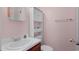 This bathroom features a vanity and a toilet and overhead storage at 804 47Th Ave. N, Myrtle Beach, SC 29577