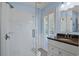 Updated bathroom showcasing a glass-enclosed shower, granite countertop, and white cabinetry for a clean and stylish finish at 804 47Th Ave. N, Myrtle Beach, SC 29577