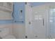 Modern bathroom featuring a glass-enclosed shower with white subway tile and updated fixtures, offering a sleek look at 804 47Th Ave. N, Myrtle Beach, SC 29577