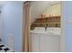 Laundry area with a stacked washer and dryer, offering convenience and functionality at 804 47Th Ave. N, Myrtle Beach, SC 29577