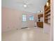 This living room has a door leading to the outside and a full kitchen with white appliances at 804 47Th Ave. N, Myrtle Beach, SC 29577