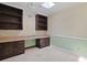 Home office showcasing built-in shelves, desk, and a light-filled atmosphere at 804 47Th Ave. N, Myrtle Beach, SC 29577