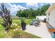 Inviting backyard with patio, outdoor seating, and lush landscaping, perfect for relaxation and entertaining at 805 Cherry Bark Ct., Myrtle Beach, SC 29579