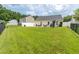 Spacious backyard with lush lawn, patio area, and privacy fence, perfect for outdoor entertaining and relaxation at 805 Cherry Bark Ct., Myrtle Beach, SC 29579