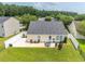 Aerial view of the backyard, showcasing a well-maintained lawn and patio space at 805 Cherry Bark Ct., Myrtle Beach, SC 29579