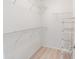 Bright walk-in closet with wire shelving and light wood floor offers organized storage solutions at 805 Cherry Bark Ct., Myrtle Beach, SC 29579