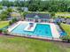 Aerial view of a community pool and sundeck, perfect for relaxing and enjoying the outdoors with Gathering and friends at 805 Cherry Bark Ct., Myrtle Beach, SC 29579