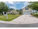 Charming home with a well-maintained yard, beautiful landscaping, and a driveway leading to an attached garage at 805 Cherry Bark Ct., Myrtle Beach, SC 29579