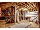 Spacious attic featuring exposed wood beams, carpet, and potential for conversion to a unique living area at 808 Myrtle Ct. # 808, North Myrtle Beach, SC 29582