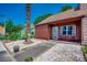 Charming exterior with decorative rock landscaping and a cozy porch area at 808 Myrtle Ct. # 808, North Myrtle Beach, SC 29582