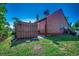 Exterior view of the home showing a neatly maintained lawn and backyard space at 808 Myrtle Ct. # 808, North Myrtle Beach, SC 29582