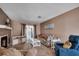 Comfortable living room with a fireplace, carpet, and sliding glass doors that offers a view to the back at 808 Myrtle Ct. # 808, North Myrtle Beach, SC 29582