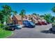 Exterior view of the building's parking lot showing ample parking spaces and well-maintained landscaping at 808 Myrtle Ct. # 808, North Myrtle Beach, SC 29582