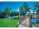 Scenic view of a community pond with a fountain, lush green grass, and a No Fishing/Dogs Allowed sign at 808 Myrtle Ct. # 808, North Myrtle Beach, SC 29582