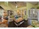 Bright living room featuring vaulted ceiling, hardwood floors, and an open floor plan with elegant decor at 81 Prestwick Dr., Pawleys Island, SC 29585