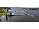 Scenic marina view showcasing multiple boats docked alongside a charming waterfront building at 81 Prestwick Dr., Pawleys Island, SC 29585