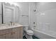 Modern bathroom featuring a vanity, toilet, and shower with beautiful tile work and contemporary fixtures at 8148 Living Tide Dr., Myrtle Beach, SC 29572