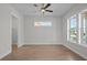 Bright bedroom with natural light, a ceiling fan, and an ensuite bathroom at 8148 Living Tide Dr., Myrtle Beach, SC 29572