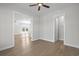 Spacious bedroom with hardwood floors, neutral paint, and ample natural light at 8148 Living Tide Dr., Myrtle Beach, SC 29572