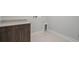 Efficient laundry room with a modern cabinet, countertop, and essential connections for laundry appliances at 8148 Living Tide Dr., Myrtle Beach, SC 29572