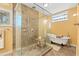 Elegant bathroom with a glass-enclosed shower, a clawfoot tub, and decorative tiles at 89 Cameron Ct., Pawleys Island, SC 29585