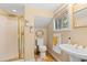 Small bathroom featuring a vanity sink, gold shower and decorative wreath at 89 Cameron Ct., Pawleys Island, SC 29585