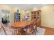 Dining room with wood table, chairs, and cabinet at 89 Cameron Ct., Pawleys Island, SC 29585