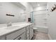 Clean bathroom featuring a white vanity and a shower-tub combo at 892 Harrison St., Myrtle Beach, SC 29579
