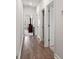 Hallway with hardwood floors leading to bedrooms at 892 Harrison St., Myrtle Beach, SC 29579
