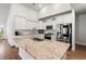 Modern kitchen with granite counters, stainless steel appliances, large island, and ample cabinet space at 892 Harrison St., Myrtle Beach, SC 29579