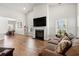 Inviting living room boasting a fireplace, hardwood floors, and lots of natural light at 892 Harrison St., Myrtle Beach, SC 29579