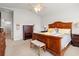 Well-lit primary bedroom featuring a ceiling fan and comfortable furnishings at 892 Harrison St., Myrtle Beach, SC 29579