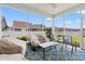 Outdoor porch with furniture perfect for entertaining at 892 Harrison St., Myrtle Beach, SC 29579