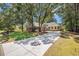 Beautiful brick home with a long driveway and mature trees in a well-maintained community at 90 Old Carriage Ln., Pawleys Island, SC 29585
