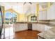 Well-equipped kitchen with stainless steel appliances, granite countertops, and ample cabinet space for storage at 90 Old Carriage Ln., Pawleys Island, SC 29585
