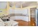 Spacious kitchen featuring granite countertops, stainless steel sink and ample cabinet space at 90 Old Carriage Ln., Pawleys Island, SC 29585
