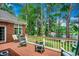 Relaxing back deck with scenic views of a tranquil lake and a fountain at 911 Tilghman Forest Dr., North Myrtle Beach, SC 29582