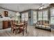 Charming breakfast nook with tile flooring, shuttered windows, and a cozy dining table at 911 Tilghman Forest Dr., North Myrtle Beach, SC 29582