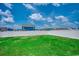 Large grassy backyard enclosed by a white privacy fence at 960 Corn Husk Loop, Conway, SC 29527