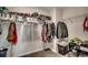 Walk-in closet with metal racks and clothing hanging on hangers at 960 Corn Husk Loop, Conway, SC 29527
