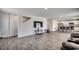 Open-concept living area with modern floors and a view of the kitchen at 960 Corn Husk Loop, Conway, SC 29527